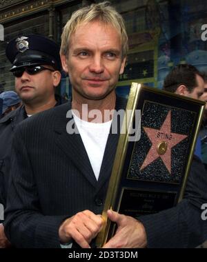 British rock star Sting carries a 