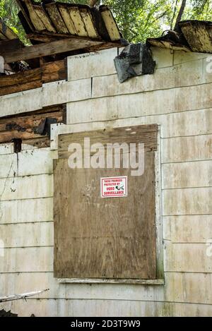 Derelict and abandoned home sits in the woods of North Central Florida. Stock Photo