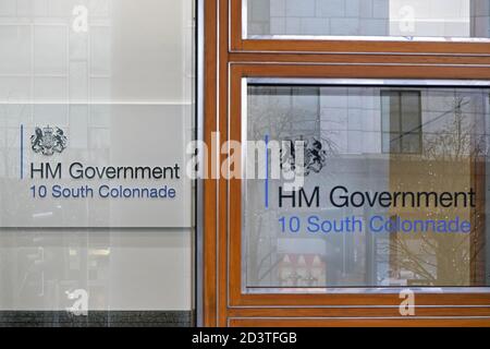 London, United Kingdom - February 03, 2019: HM Government sign at their offices on 10 South Colonnade. Her Majesty's Government, is the central admini Stock Photo