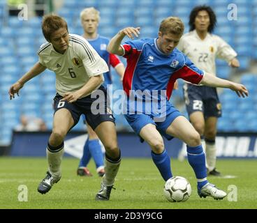 Japan S Inamoto Struggles For The Ball Against Iceland S Helguson During Their Three Nation Tournament Soccer Match In Manchester Japan S Junichi Inamoto R Struggles For The Ball Against Iceland S Heidar Helguson During Their Three Nation