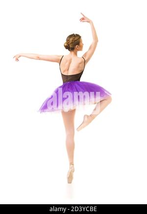 woman in purple tutu and black leotard dance ballet. Studio shot on white background , isolated images. Stock Photo