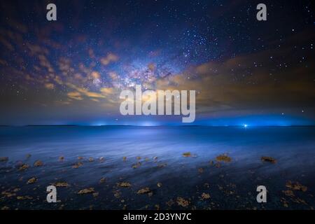 The Milky Way behind clouds at the southern tip of Florida in Everglades National Park. This was photographed in the Flamingo Campground area. Stock Photo