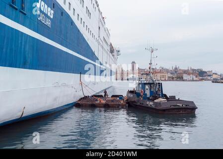 Marine vessel pumping out sewage from a ferry boat, Genoa, Liguria, Italy, Stock Photo