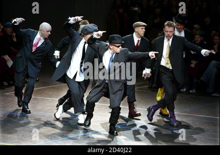 British Ska Band Madness Perform A Dance As They Display Creations By Japanese Designer Yohji Yamamoto As Part Of His Fall Winter 2004 2005 Men S Collection At Paris Fashion Week January 24 2004 Stock Photo Alamy
