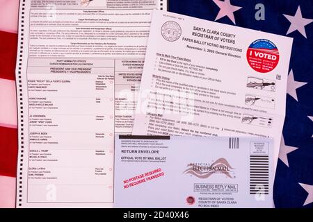 Official Ballot for Mail-In Voting during the 2020 presidential election. Background the flag of the United States - San Jose, California, USA - Octob