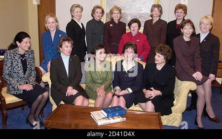 U.S. Women Senators for the newly-elected 108th Congress gather for a 'family' photo January 9, 2003 on Capitol Hill. (L to R seated): Olympia Snowe (R-ME), Mary Landrieu (D-LA), Blanche Lincoln (D-AK), Barbara Boxer (D-CA), Susan Collins (R-ME), Dianne Feinstein (D-CA) and Maria Cantwell (D-WA). (L to R standing): Hillary Rodham Clinton (D-NY), Elizabeth Dole (R-NC), Kay Bailey Hutchison (R-TX), Barbara Mikulski (D-MD), Lisa Murkowski (R-AK), Debbie Stabenow (D-MI) and Patty Murray (D-WA). REUTERS/Mike Theiler  MT