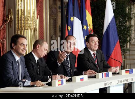 French President Jacques Chirac (2nd R), asks for questions during a press conference with Spanish Prime Minister Jose Luis Rodriguez Zapatero (L), Russian President Vladimir Putin (2nd L) and German Chancellor Gerhard Schroeder (R) after a meeting at the Elysee Palace in Paris March 18, 2005.