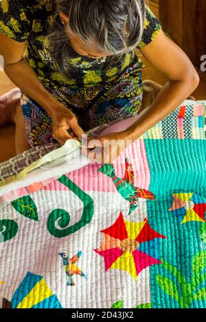 Quilt making in Caohagan Island off Cebu in the Phlippines Stock Photo