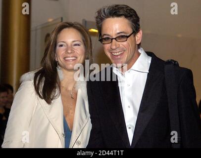 Actor Robert Downey, Jr. and guest Susan Levin arrive for the Kennedy Center Honors gala performance at the Kennedy Center, December 5, 2004 in Washington. This year the Kennedy Center is honoring actor Warren Beatty, singer Sir Elton John, conductor John Williams, soprano Joan Sutherland and husband and wife team Ossie Davis and Ruby Dee. Recipients are recognized for their lifetime contributions to American culture through the performing arts. REUTERS/Mike Theiler  MT/SV