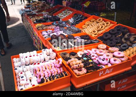 Donuts in a basket for sale in street markets Stock Photo