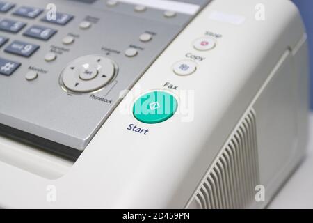 The fax machine use for Sending documents in the office, concept equipment needed in office Stock Photo