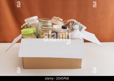 Food donations box isolated on table Stock Photo