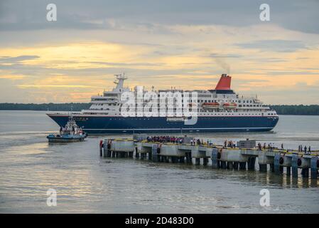 Kuala Lumpur, Malaysia - December 2, 2019: MS Nippon Maru cruise ship sailing off at sunset in port Klang near Kuala Lumpur, Malaysia, Asia. Stock Photo
