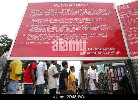 Indonesians Working In Malaysia Stand In Line At The Indonesian Embassy Taking Advantage Of Amnesty Offered