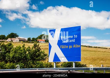 Road sign on the A1 at the border between Scotland and England near Berwick-upon-Tweed. Stock Photo