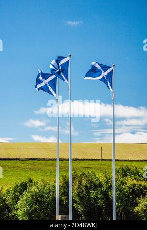 Scotland and England border with Scottish flags and welcome to Scotland ...