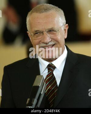 Former right-wing Czech Prime Minister Vaclav Klaus smiles during his speech at the parlimentary session in the Spanish Hall at Prague Castle January 24, 2003. Czech lawmakers began on Friday their second attempt at electing a successor to President Vaclav Havel, but the battle to replace East Europe's elder statesman is likely to collapse once again amid political wrangling.  REUTERS/Petr Josek REUTERS