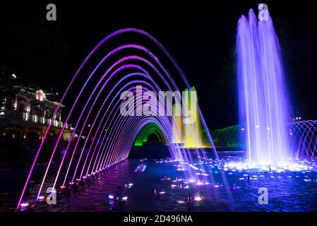 Fountains in the city. Colored night fountain, Krasnodar city, Russia Stock Photo