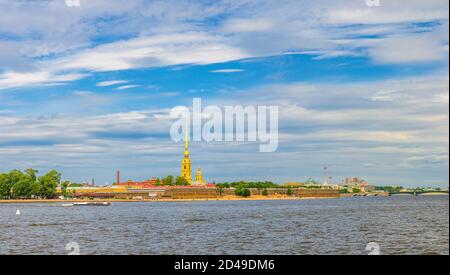 Panorama of Saint Petersburg Leningrad city with Peter and Paul Fortress citadel, Saints Peter and Paul Cathedral Orthodox church with spire, fortress walls on Zayachy Hare Island, Neva river, Russia Stock Photo