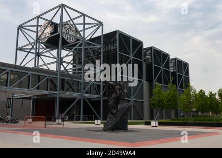Milwaukee, WI, USA May 28 2011: The building entrance to the Harley-Davidson Museum in Milwaukee, Wisconsin with a statue in front. Stock Photo