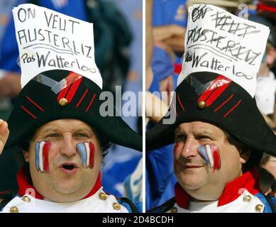 - COMBO PHOTO - A combination photograph shows a French soccer fan (L) dressed as Napoleon wearing a sign reading 'We want Austerlitz, not Waterloo' before the World Cup Finals match in Inchon between France and [Denmark] on June 11, 2002, and the amended sign (R) after their 2-0 defeat. The sign is a reference to Napoleonic France's victory at Austerlitz and defeat at Waterloo.