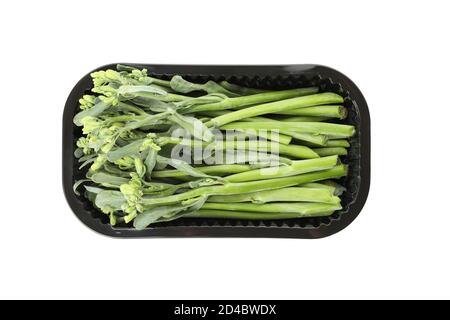 Plastic container with broccolini isolated on white background Stock Photo