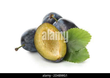 Plums and leaves isolated on white background Stock Photo