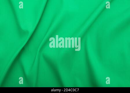 Wavy green fabric, cloth fabric texture or background, high resolution Stock Photo