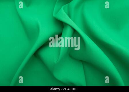 Wavy green fabric, cloth fabric texture or background, high resolution Stock Photo