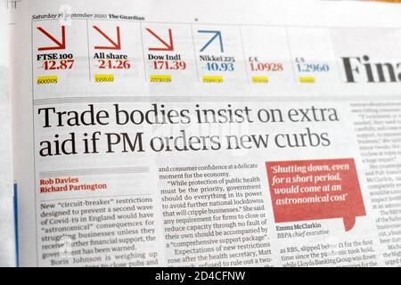 Newspaper headline 'Trade bodies insist on extra aid if PM orders new curbs'  inside page article in Financial section Guardian Sept 2020  London UK Stock Photo