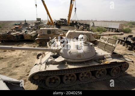 Destroyed Iraqi tanks from Gulf War 1 which lie in the Kuwait desert ...