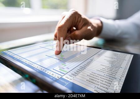 Gantt Chart On Tablet Computer. Diary Agenda Planner Stock Photo