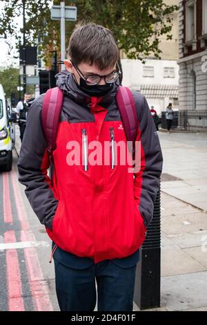 Benjamin Clark, 18, of Wilton Crescent, Hertford, exits Westminster Magistrates' Court in London, charged with criminal damage to the Sir Winston Churchill statue in Parliament Square on September 10, the final day of ten days of Extinction Rebellion protests in the capital and admitted causing £1,642.03 worth of damage to the statue and spraying the word 'racist' in chalk paint, but denied causing all the damage to the statue done on the day. Deputy Chief Magistrate Tan Ikram handed down a £200 fine and ordered Clark to pay £1,200 in compensation. Stock Photo