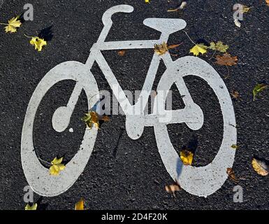 bicycle painted on bicycle path in Hallabrottet Kumla Sweden Stock Photo