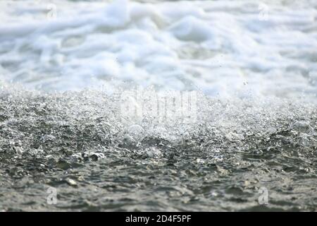 Water splash in river rapids Stock Photo