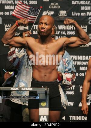 WBC/WBA/IBF welterweight champion Zab Judah of Brooklyn, New York poses on the scale during a weigh-in at the MGM Grand Garden Arena in Las Vegas, Nevada May 13, 2005. Judah (32-2) defends his titles against Cosme Rivera (28-7-2) of Los Angeles, California at the arena May 14. Judah weighed 146.5 pounds. Rivera weighed 146 pounds. REUTERS/Steve Marcus  SM/SV