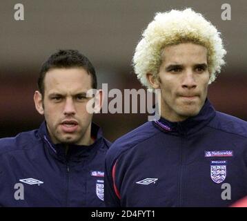 England goalkeepers West Ham United ' David James (R), and Arsenal' Richard Wright are put through their paces during training at West Riding FA ground, Woodlsford, Leeds, March 25, 2002. [England are due to face Italy in a friendly on Wednesday March 27.]