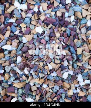A set of white, violet, grey and rusty brown stone for landscaping, garden paths, flower arrangement Stock Photo