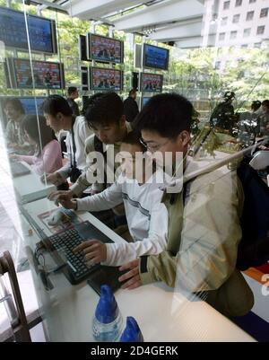 Japanese Soccer Fans Surf The Net In The Nakata Net Cafe Which Is Owned By Star