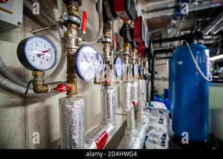 Pressure sensor in an industrial boiler room. Barometer in the heating system. Close-up. Stock Photo