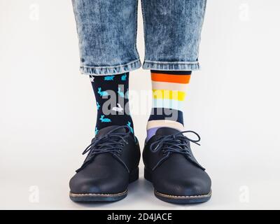 Men's legs, trendy shoes and bright socks Stock Photo