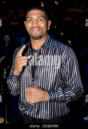 Boxer Winky Wright of St. Petersburg, Florida poses before a performance by Stevie Wonder at the Tiger Jam VIII benefit concert at the Mandalay Bay Events Center in Las Vegas, Nevada, May 21, 2005. Proceeds from the annual event will be used to help fund various children's charities supported by the Tiger Woods Foundation. Wright defeated Felix 'Tito' Trinidad in a WBC middleweight championship elimination bout at the MGM Grand in Las Vegas on May 14. REUTERS/Ethan Miller  EM