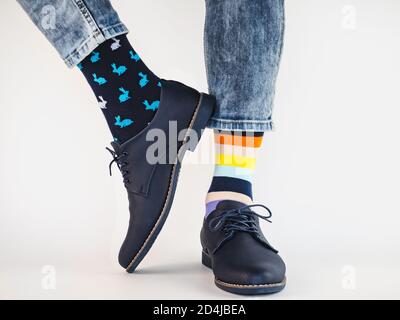 Men's legs, trendy shoes and bright socks Stock Photo