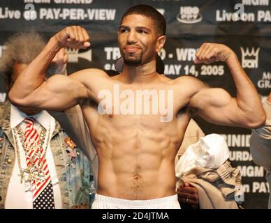 Middleweight boxer Winky Wright of St. Petersburg, Florida poses on the scale during an official weigh-in at the MGM Grand Garden Arena in Las Vegas, Nevada, May 13, 2005. Wright (48-3) takes on Felix 'Tito' Trinidad (42-1) of Cupey Alto, Puerto Rico in a 12-round WBC championship elimination bout at the arena May 14. Both fighters weighed the 160 lb. limit. REUTERS/Steve Marcus  SM/HK