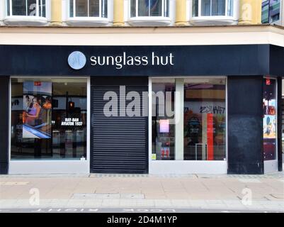 Sunglass hut logo is seen at one of their stores on Oxford Street in London.  (Photo by Belinda Jiao / SOPA Images/Sipa USA Stock Photo - Alamy