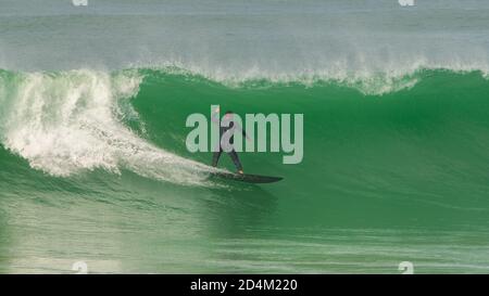 Surfer in a big wave, Anglet in the pays basque, France Stock Photo
