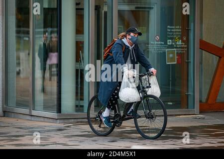 Edinburgh, Scotland, UK. 9th Oct 2020. Hospitality staff from across the capital dumped their excess ice outside the Scottish Parliament after being ordered to close from 6pm today under new Coronavirus restrictions. Photo: Andrew Perry/Alamy Live News Stock Photo