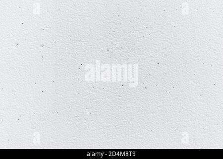 Blank concrete white rough wall for background. Beautiful white exposed aggregate wall plastered surface background pattern. Stock Photo