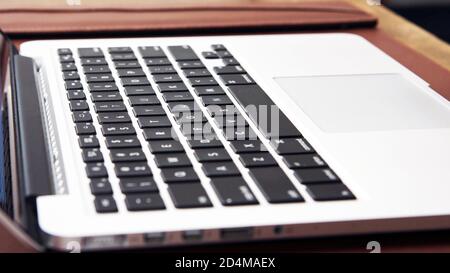close up view of laptop computer keyboard on work office. Stock Photo