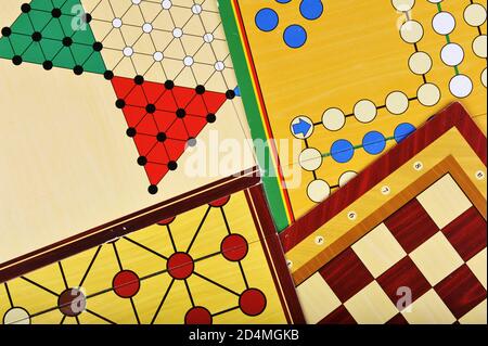 Various board games of ludo, halma, chess and fox and geese Stock Photo